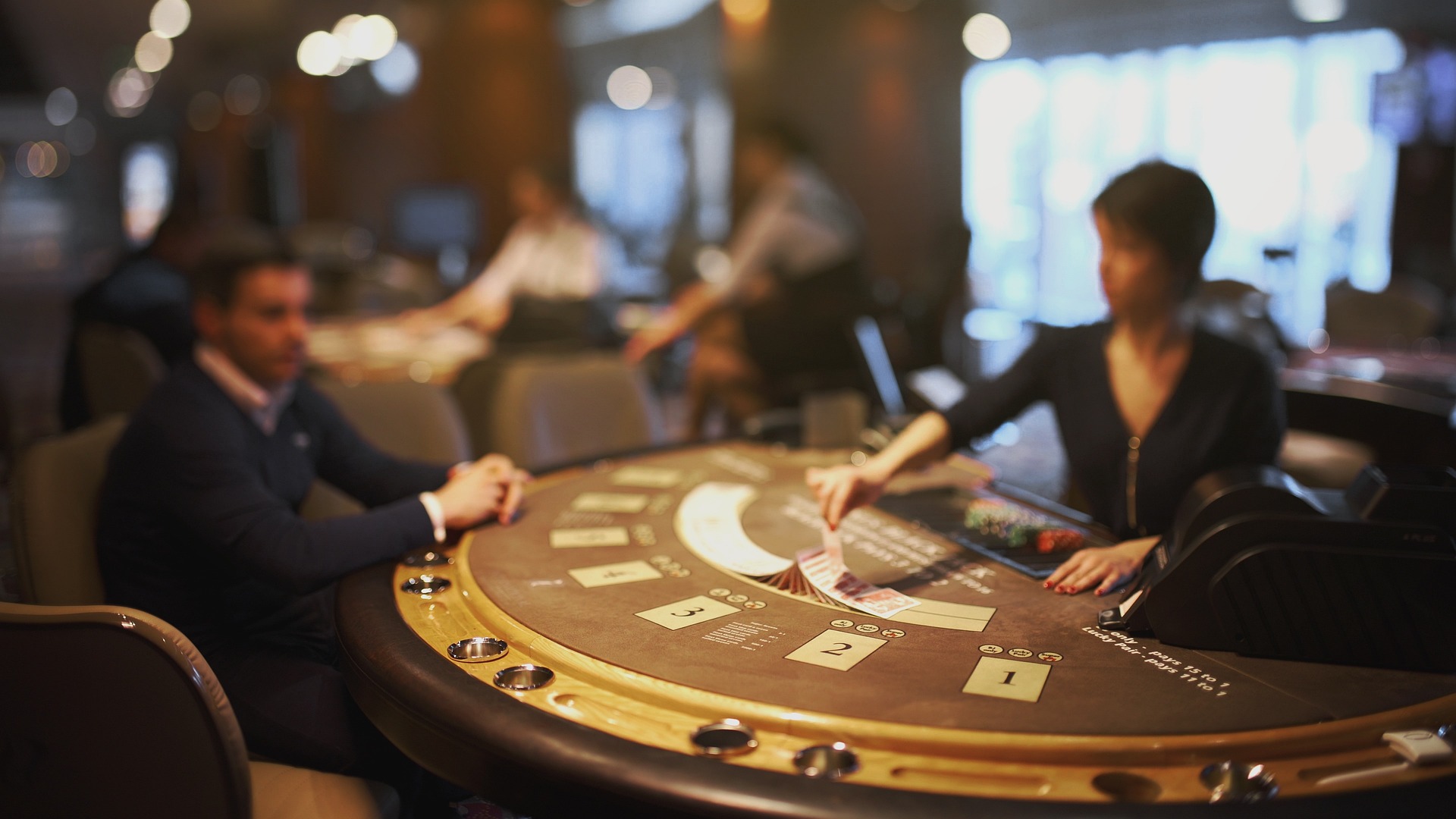 Blackjack card table between player and dealer