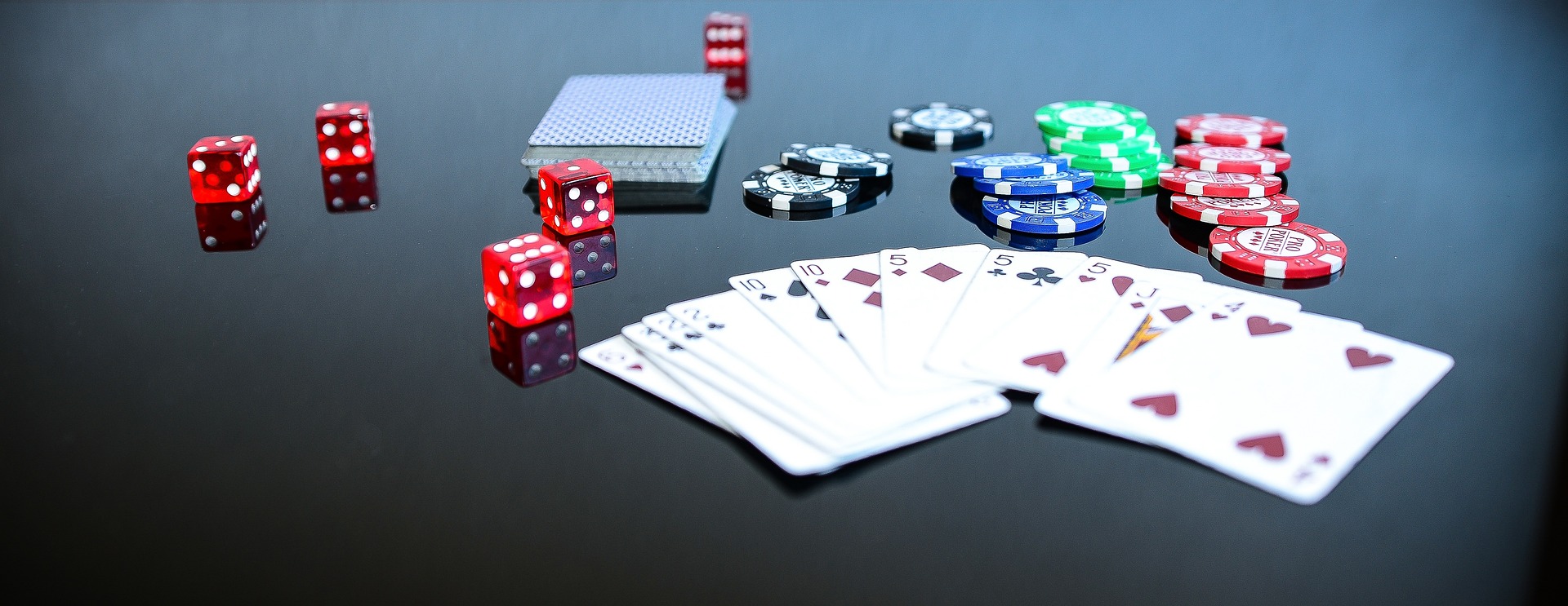 Casino game of poker and dice