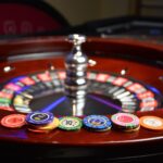 Casino chips on a roulette wheel