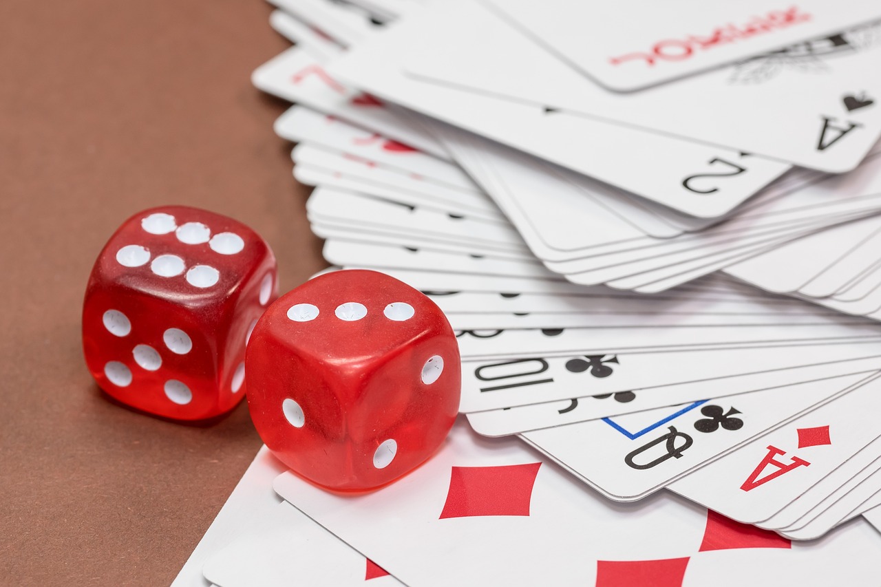 Rummy cards and dice