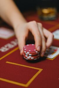 dealer placing casino chips