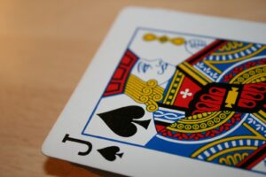 a close up of a playing card on a table
